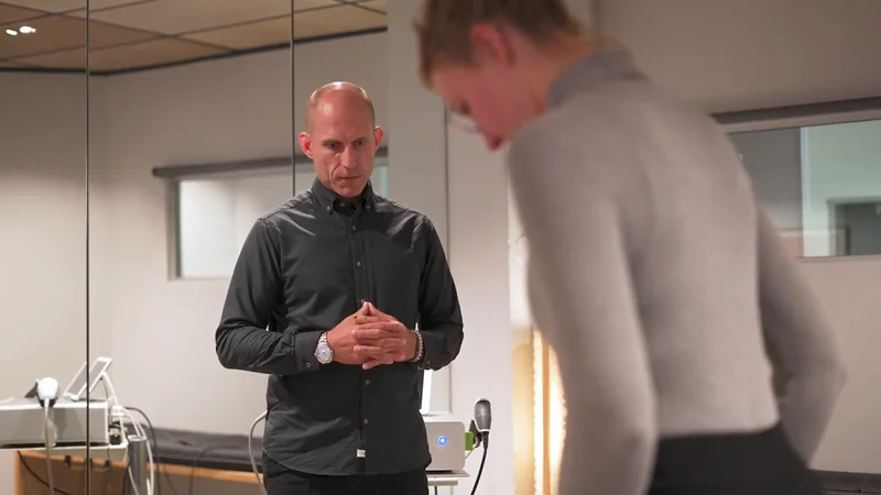 Tobias Hall assessing a patient’s movement at Severn Clinics