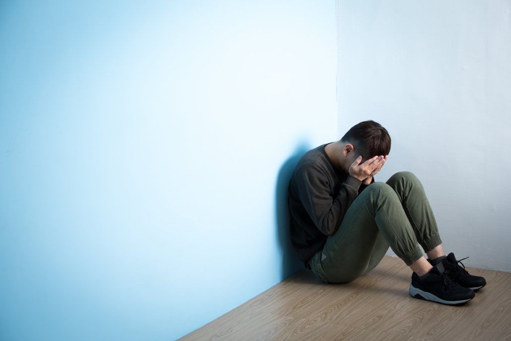 Man with depression that can lead to chronic pain image