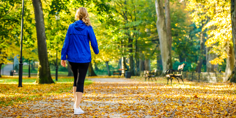 A woman walking in a park
